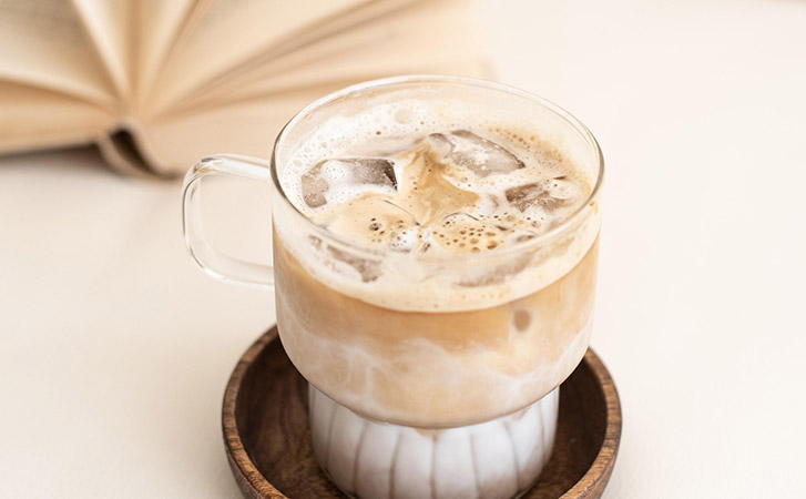 A White Russian cocktail in a clear glass